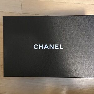 CHANEL shoe box with original tissue, floret, labels, ribbon, shoe stretchers.